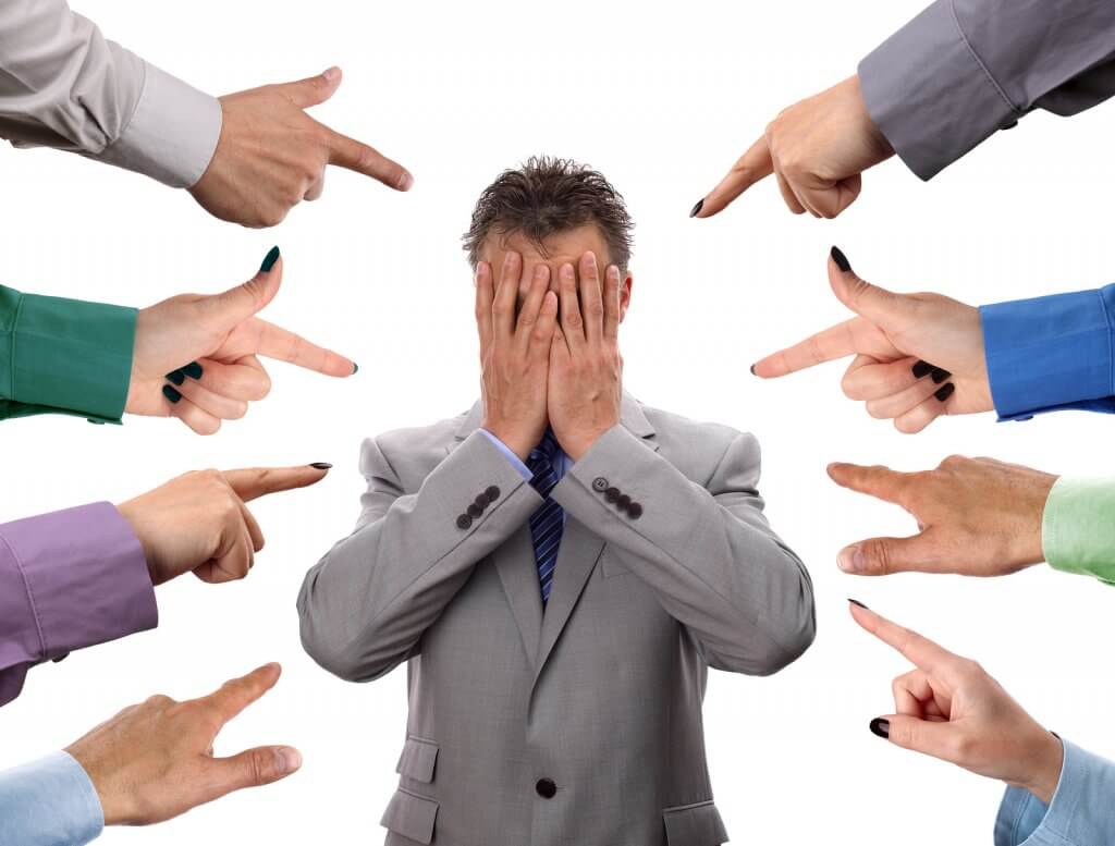 person being judged by others