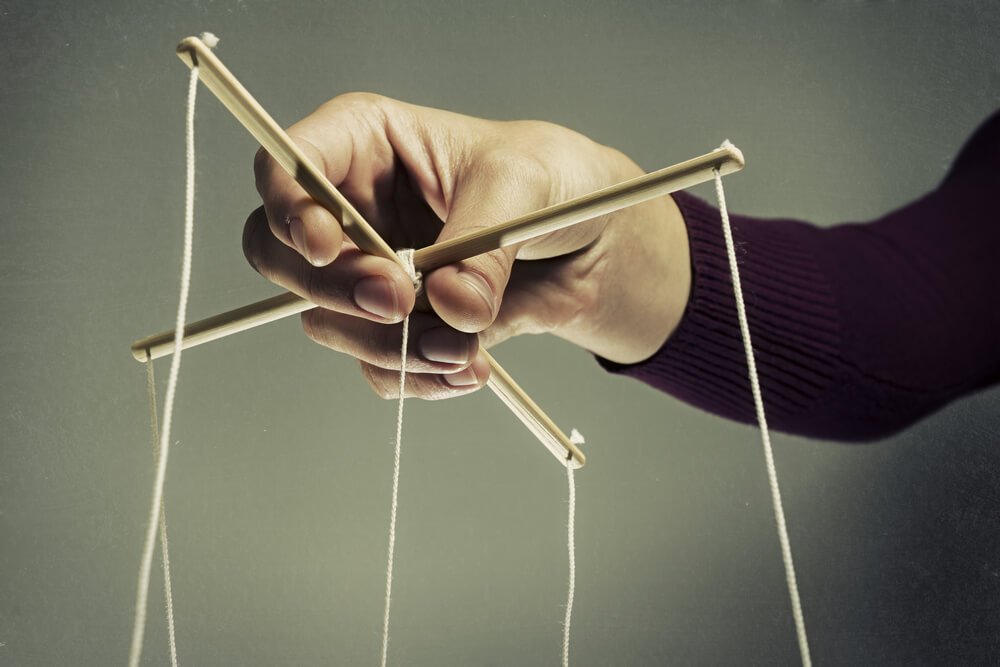 Techniques of manipulation: puppet strings.