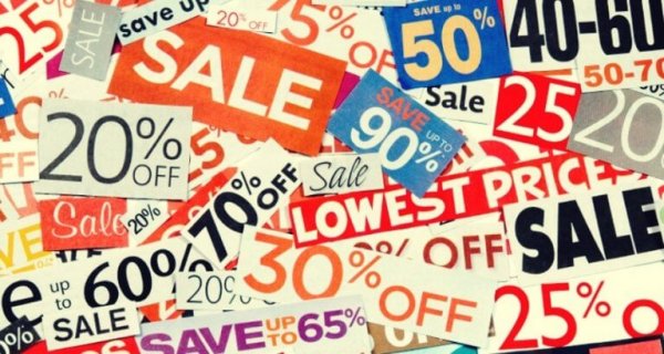 Many sales and discounts signs depicting the framing effect.