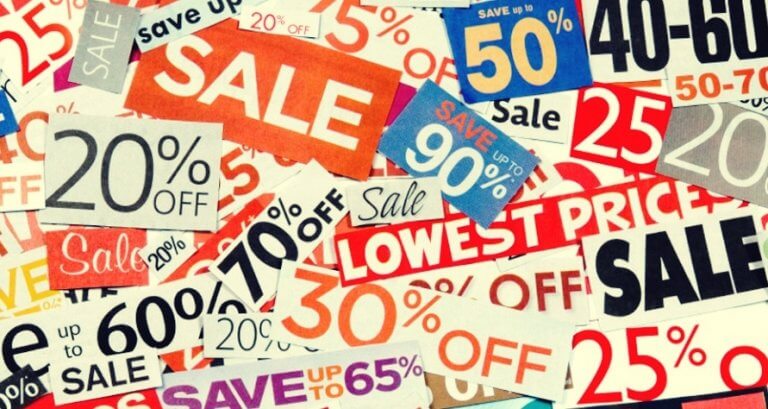 Many sales and discounts signs.