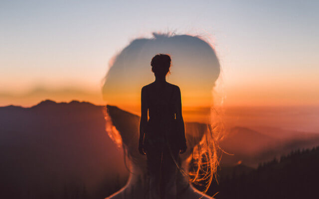 The silhouette of a woman.