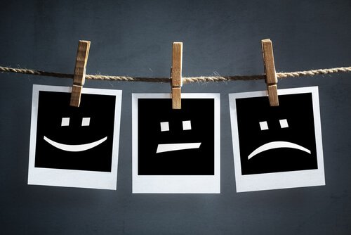 Three faces with three different emotions.