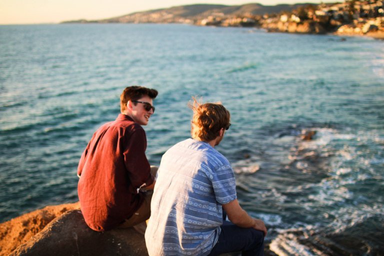 Two young men are friends.