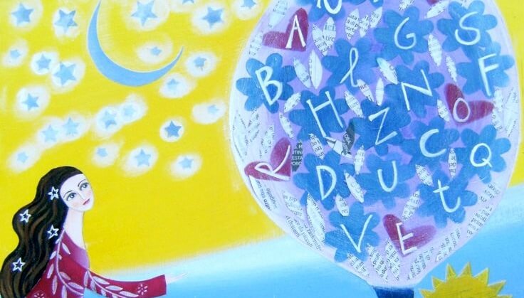 woman looking up at a balloon with letters