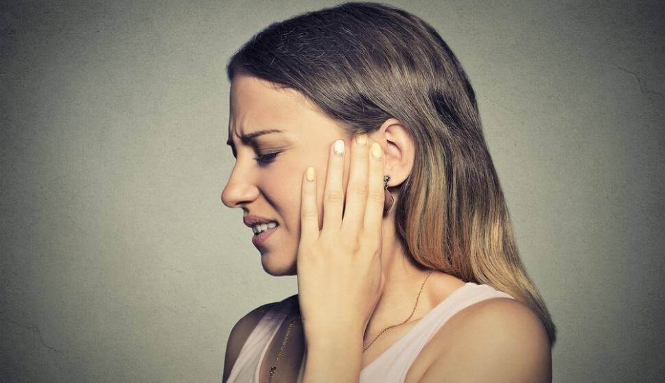 A woman is suffering from misophonia.