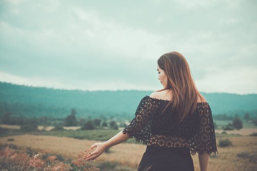 Woman walking in the countryside