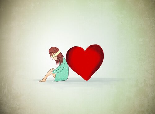 A blindfolded girl leaning on a heart.