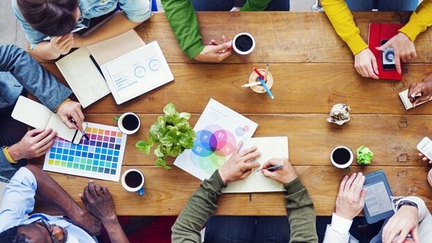 A group of people at a work meeting.