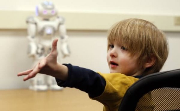 Children with autism and robots.