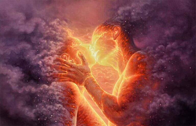 A couple wrapped in fire kissing.