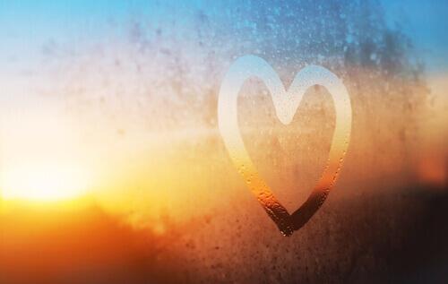 heart drawn on window representing psychology quotes