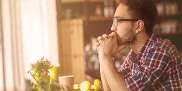 man thinking about managing failure