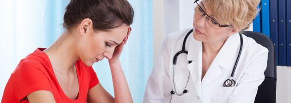 woman talking to doctor about white coat hypertension
