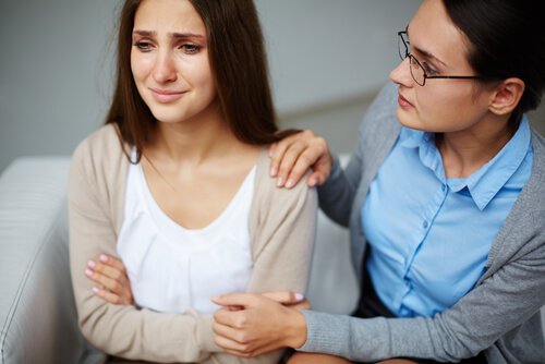 woman crying after someone's sexual coercion