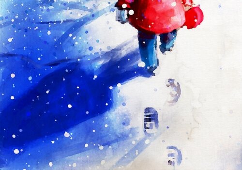 Boy walking in snow