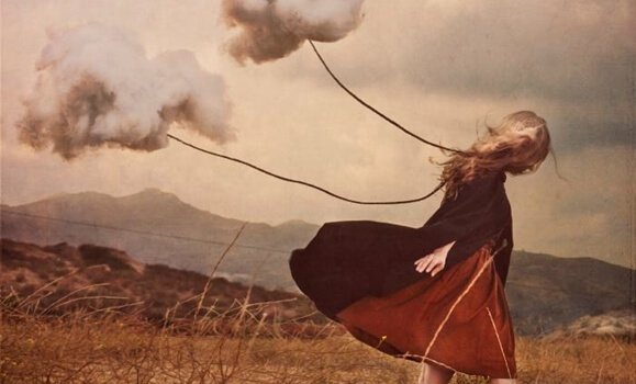 Clouds following a girl