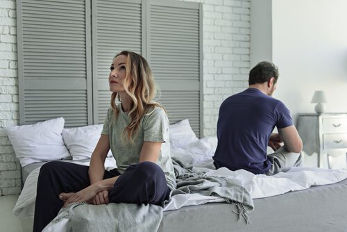 couple in bedroom not speaking