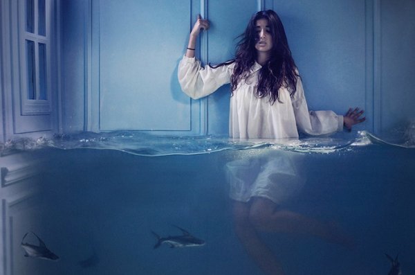 Girl submerged in water: fear masquerading as laziness.