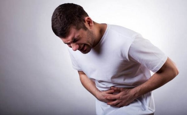 man in pain as an example of a mark of psychological violence on the body