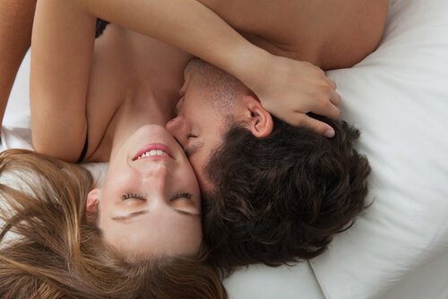 couple in bed going through the sexual response cycle