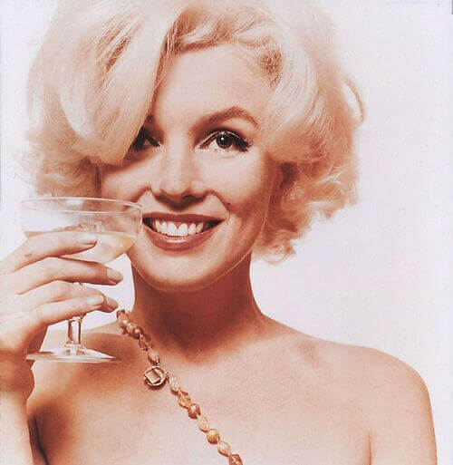 marilyn monroe holding a wine glass