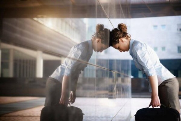 An exhausted woman at work.