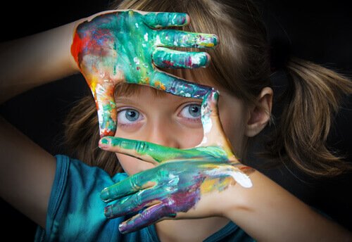 What does a gifted child look like? Child with paint
