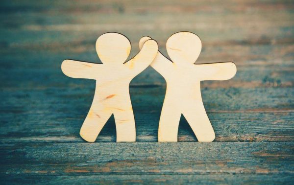 Two figures representing social exchange