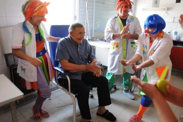a patient participating in laughter therapy