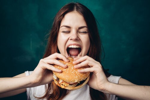 Woman hunger for hamburger