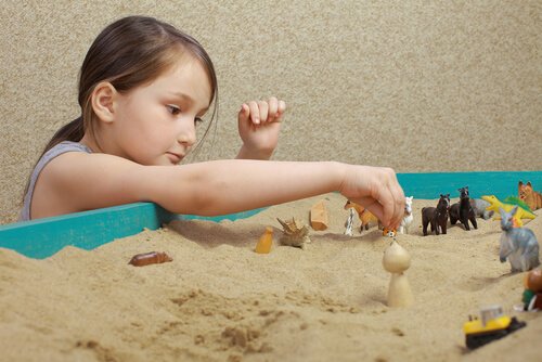 girl playing sandbox