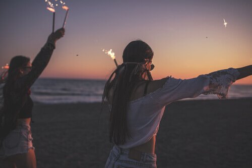 Teens having a party on the beach