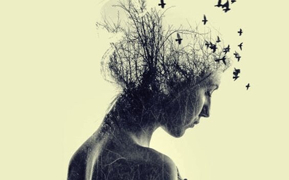 Woman with birds flying around head