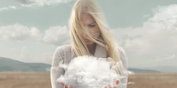 Woman with cloud in her hands