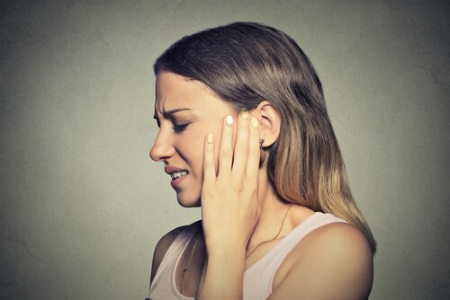Woman with ear problems