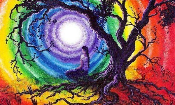 woman-sitting-by-tree