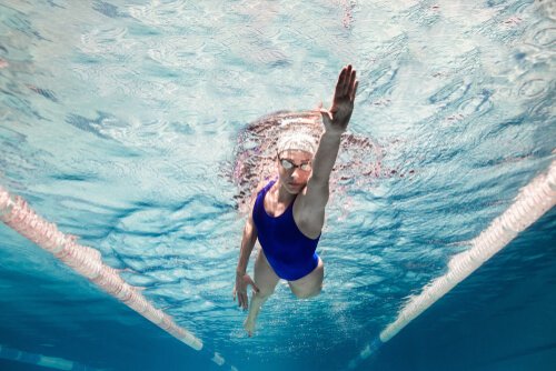 Woman swimming in pool