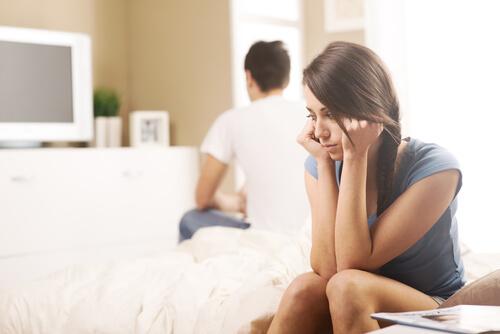 sad woman with malaxophobia