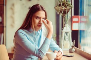 A sad 30-year-old woman.