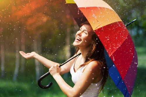Face your darkest emotions like the woman enjoying the rain.