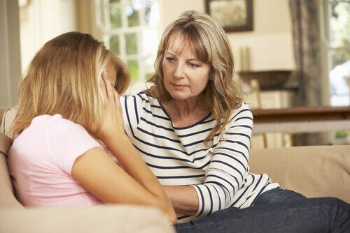 Teenager talking with her mother.