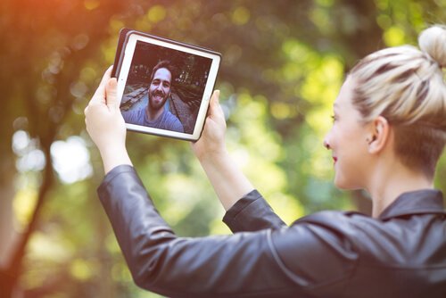 A woman making video calls with her boyfriend promotes communication.