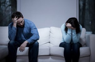 Angry couple showing signs of a marriage crisis.