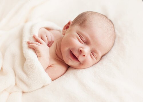 Small baby smiling.