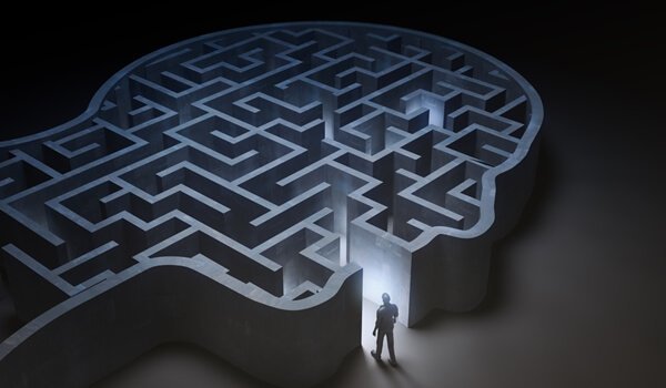 A man going into a maze.
