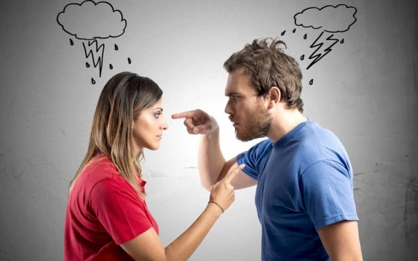 A couple immersed in an argument where one feels superior over the other.