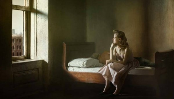 Edward hopper painting woman looking out window.