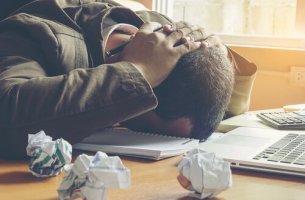 A man, exhausted by his perfectionism.