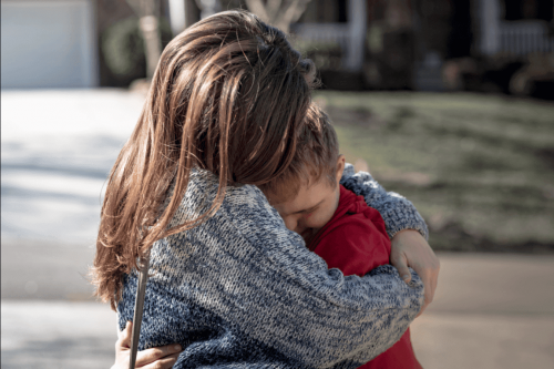 Hugging children with disabilities