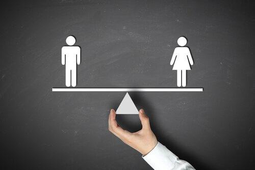 Man and woman on a scale in the absence of gender inequality.
